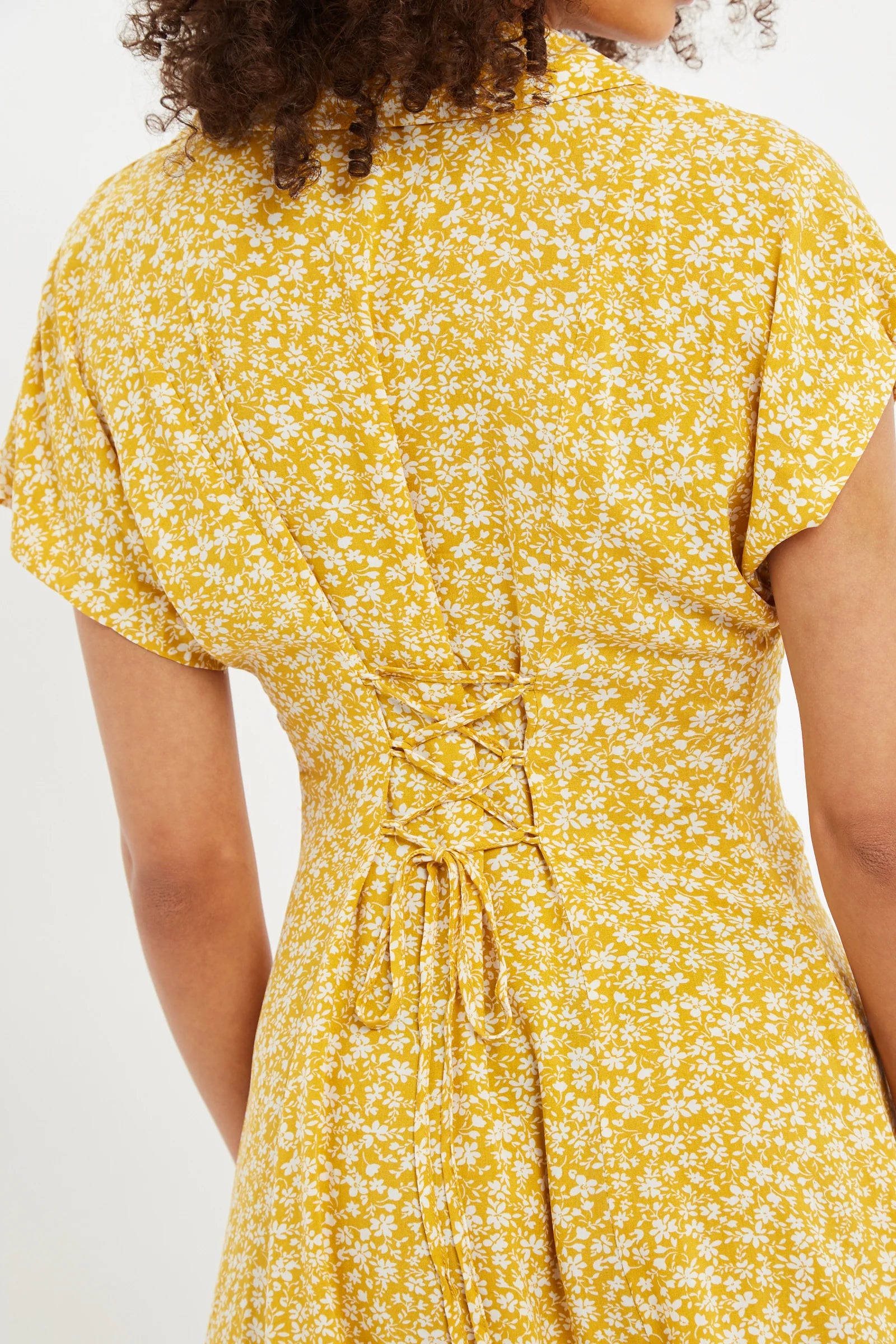Prudence Micro Blossom Print Short Sleeve Laced Back Mini Dress In Yellow Dresses 8 Yellow 8 / Yellow 10 / Yellow 12 / Yellow 14 / Yellow 16 / Yellow